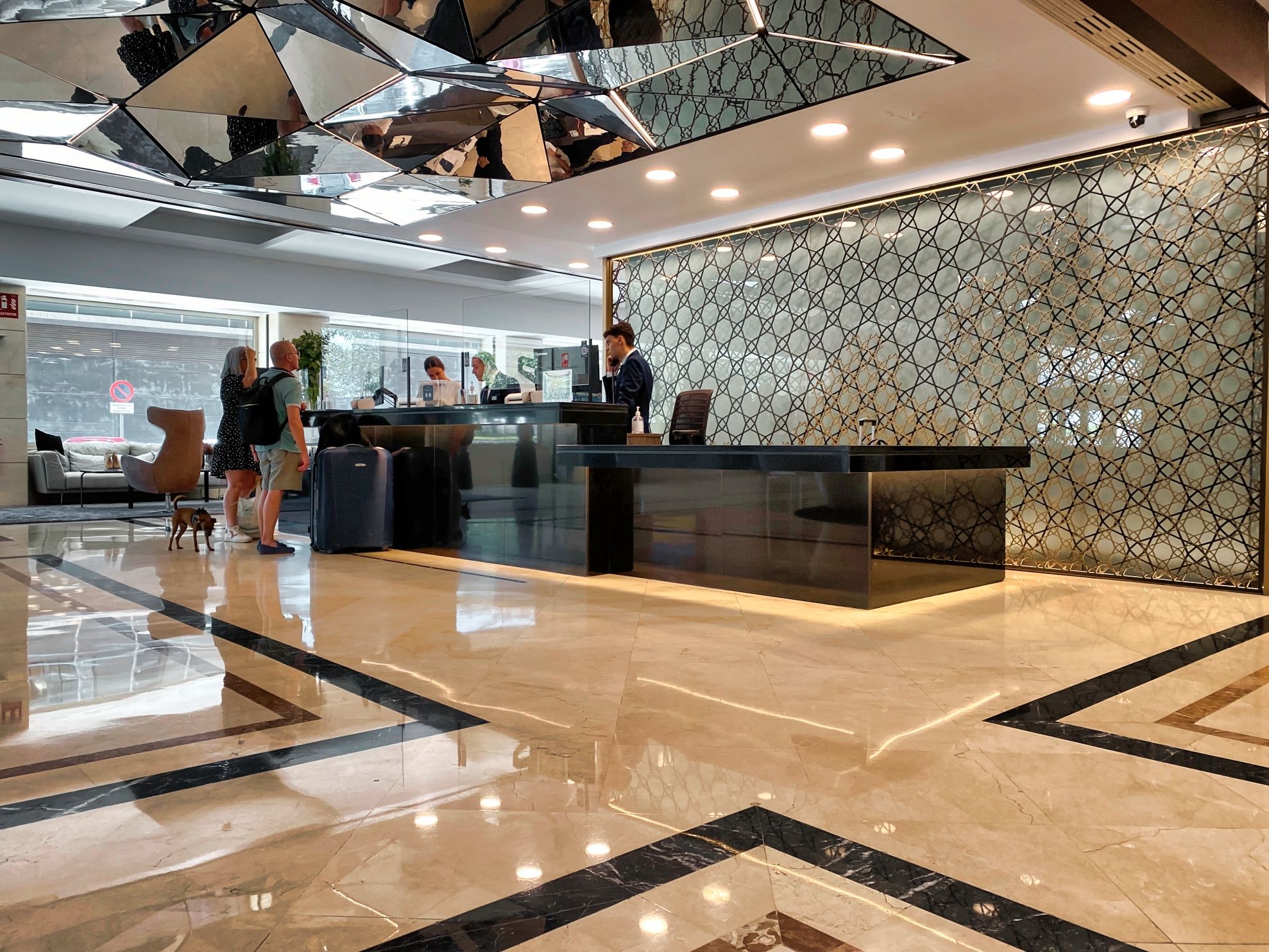 Reception desk at a hotel, with two heights and good contrast.